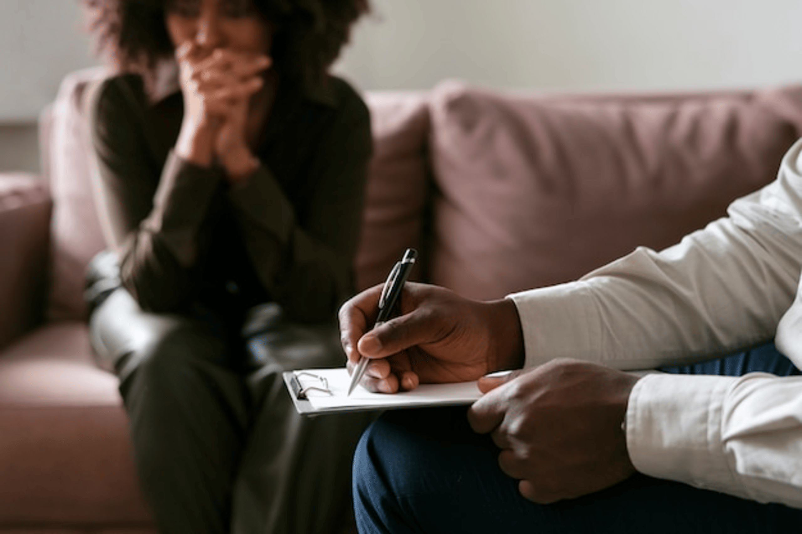 A person speaking with a psychiatry provider during a psychiatric evaluation session