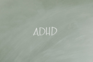 A chalkboard with the word ADHD written on it