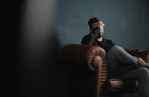 A person holding their head