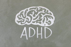 An ADHD illustration on a chalkboard